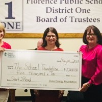 Duke Energy Foundation presents $5,000 check to The School Foundation